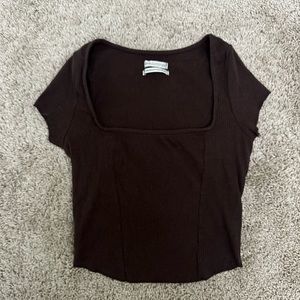 Brown Urban Outfitters short sleeve shirt.